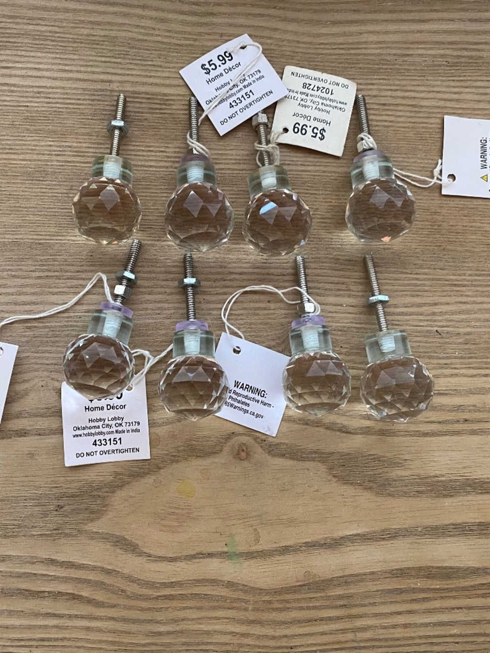 New with tags clear, faceted round crystal-style glass cabinet knobs,